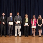 GSA E-board standing on stage with the faculty award recipients